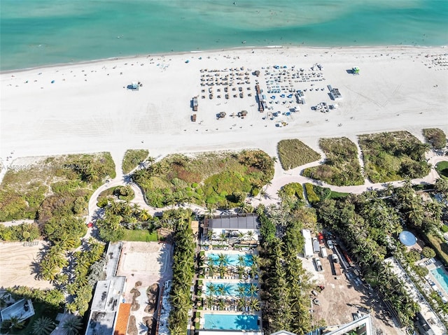 drone / aerial view with a view of the beach and a water view