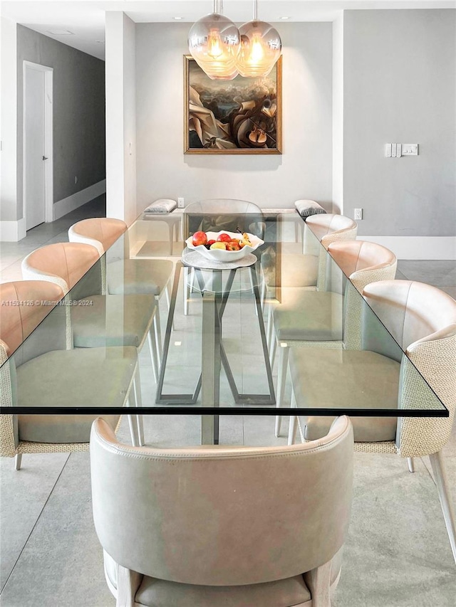 dining area with concrete floors