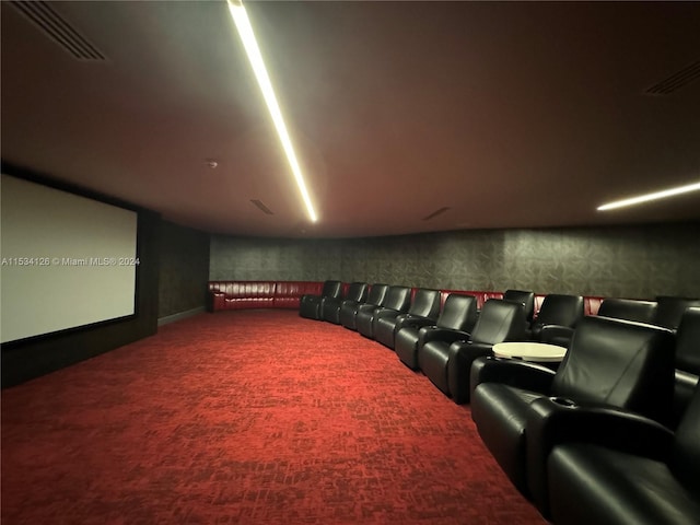 cinema room featuring carpet floors