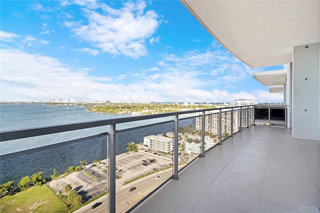 balcony featuring a water view