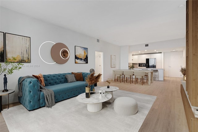 living room with light wood-type flooring