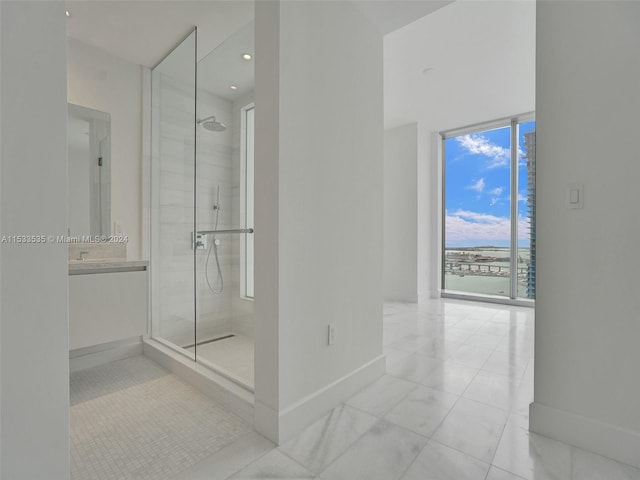 bathroom featuring tile floors and walk in shower