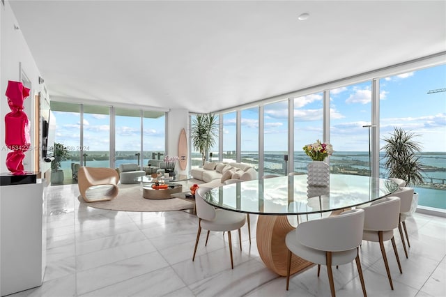 sunroom with a water view