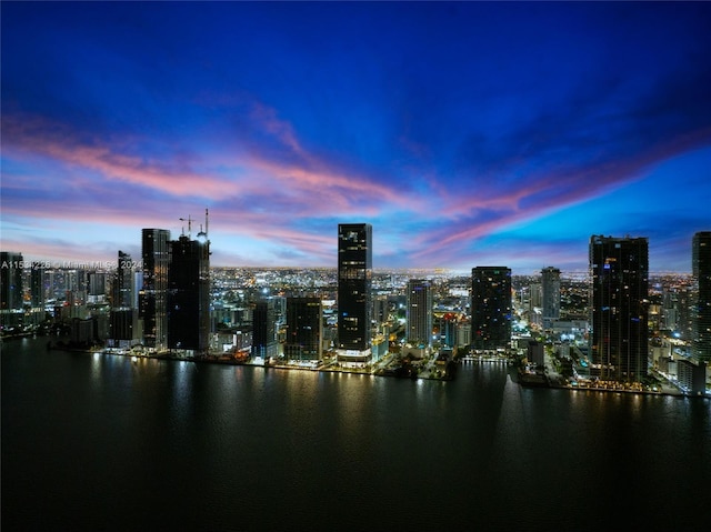 property's view of city featuring a water view