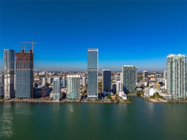 property's view of city with a water view