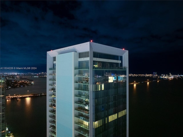 view of property with a water view