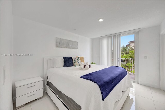 tiled bedroom featuring access to outside