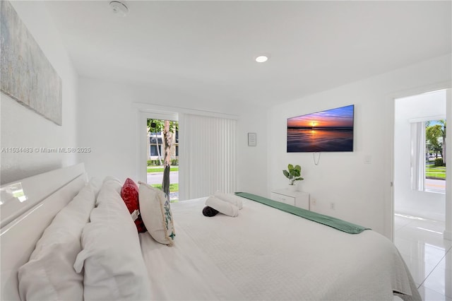 bedroom with light tile patterned flooring