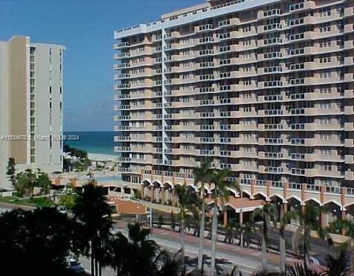 view of property with a water view