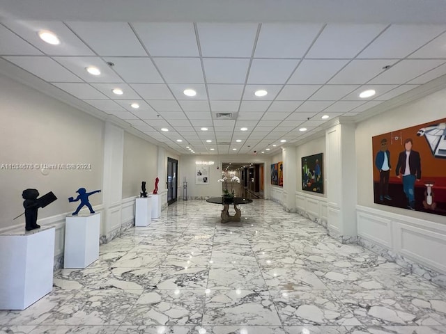 hallway featuring light tile flooring