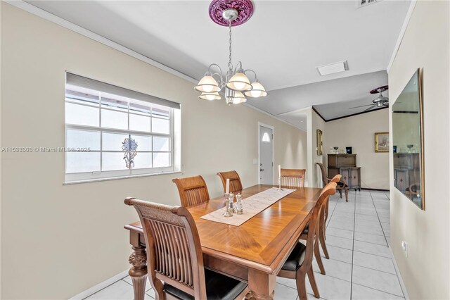 dining room featuring ornamental molding, lofted ceiling, light tile patterned floors, and ceiling fan with notable chandelier