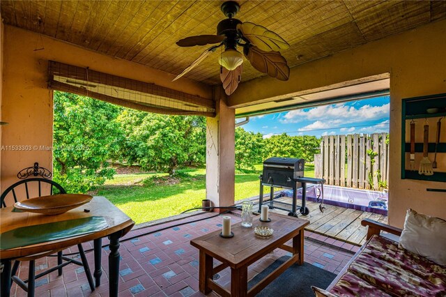 view of patio / terrace featuring a gazebo and ceiling fan