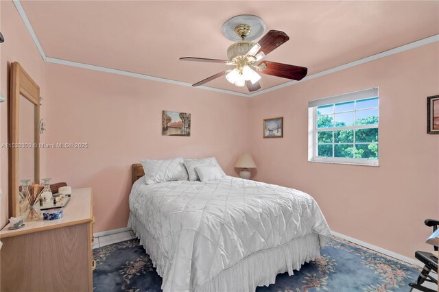 bedroom featuring crown molding and ceiling fan