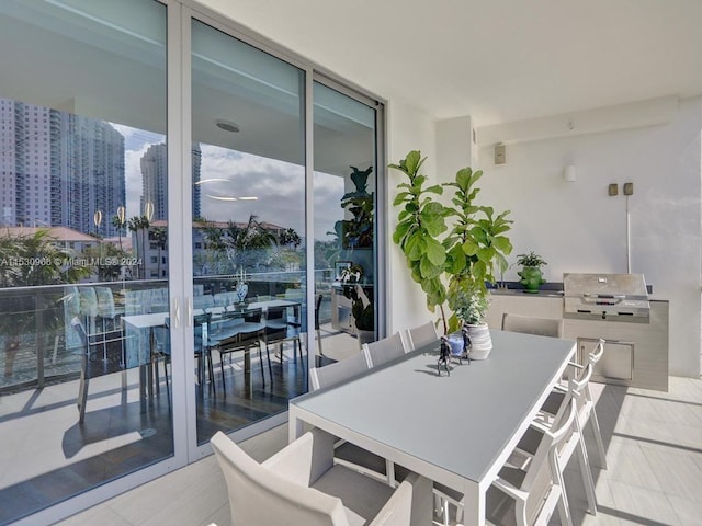 view of patio / terrace featuring area for grilling and a balcony