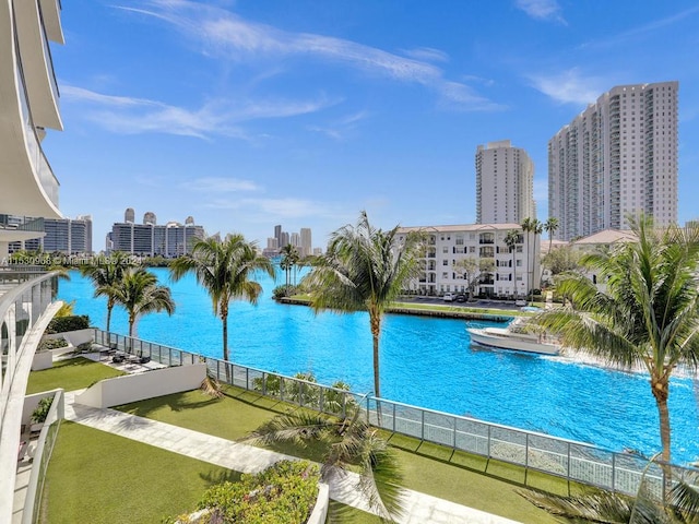 view of pool featuring a water view