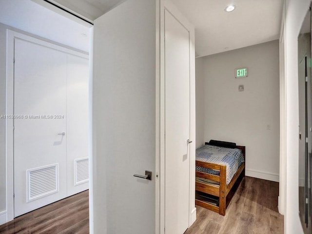 bedroom featuring a closet and hardwood / wood-style floors