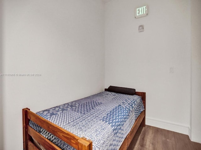 bedroom featuring hardwood / wood-style floors