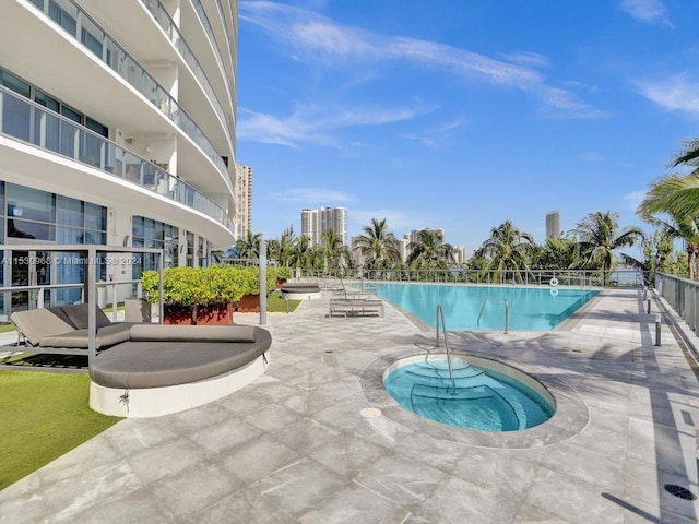 view of pool featuring a patio