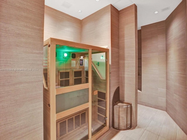 view of sauna / steam room featuring tile patterned floors