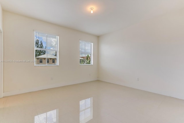 view of tiled spare room