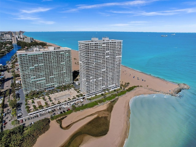 drone / aerial view with a view of the beach and a water view