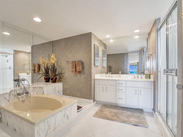 bathroom with separate shower and tub, tile floors, dual bowl vanity, and washer / dryer