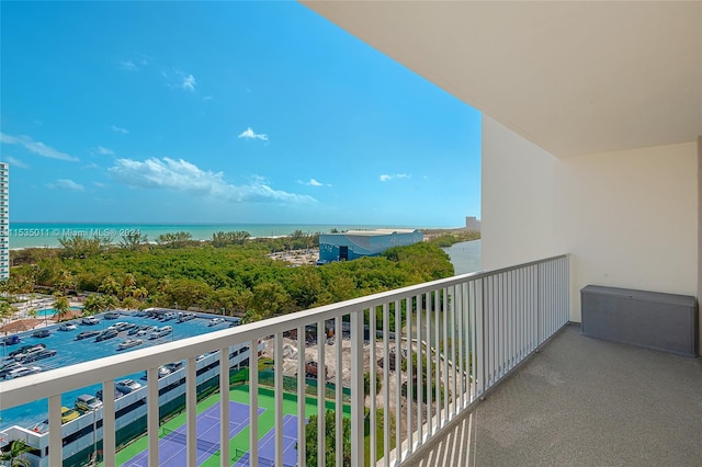 balcony featuring a water view