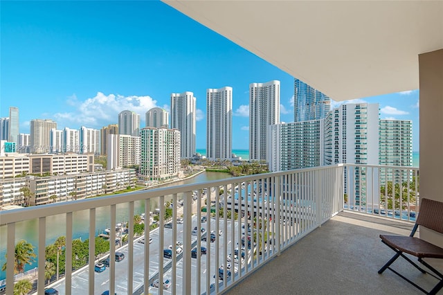 balcony featuring a water view