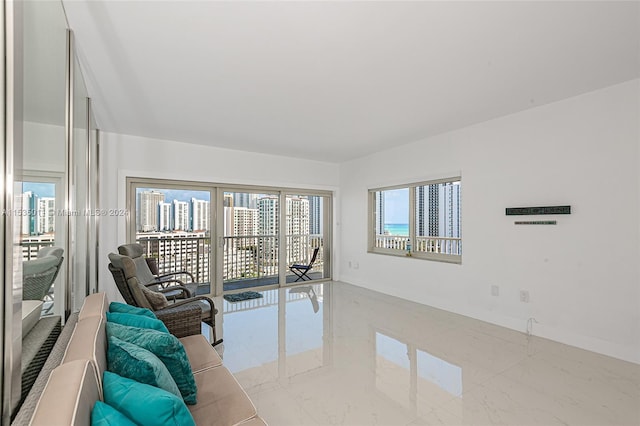 living room featuring light tile floors