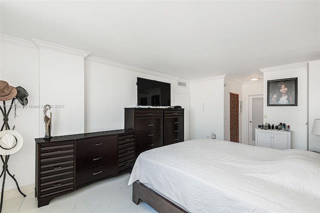 tiled bedroom with crown molding