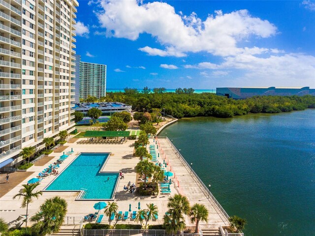 birds eye view of property featuring a water view