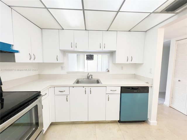 kitchen with stainless steel appliances, white cabinets, and sink