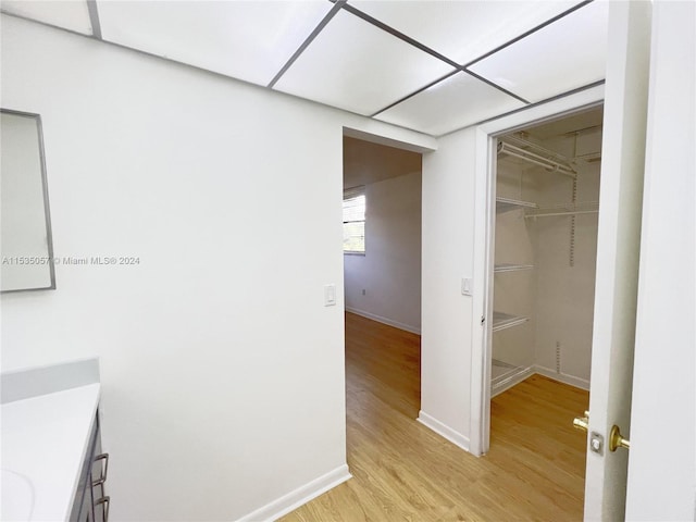 bathroom featuring vanity and hardwood / wood-style flooring