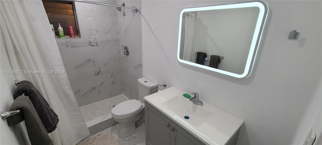 bathroom with walk in shower, oversized vanity, and toilet