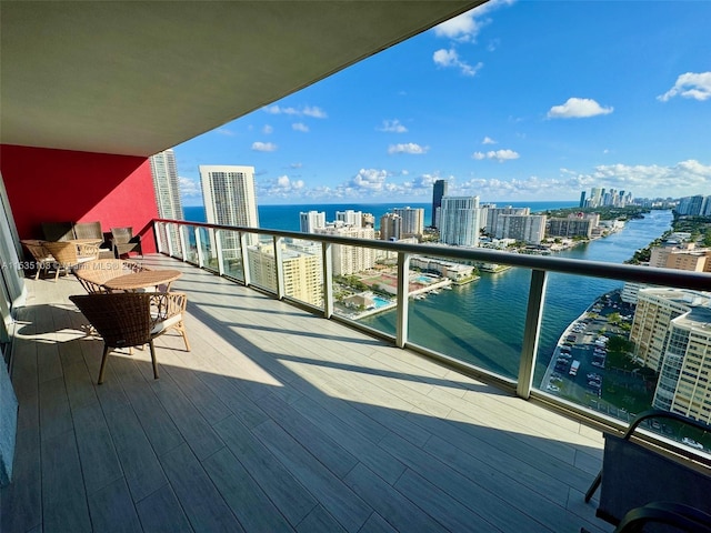 balcony featuring a water view