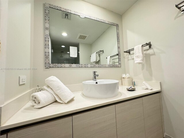 bathroom featuring oversized vanity