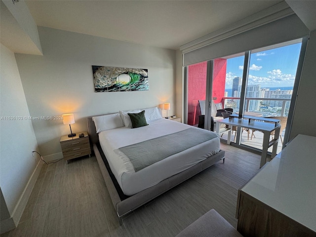 bedroom featuring dark hardwood / wood-style floors