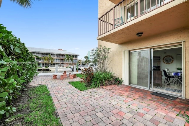 view of patio with a balcony