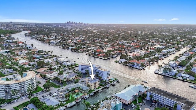 birds eye view of property featuring a water view