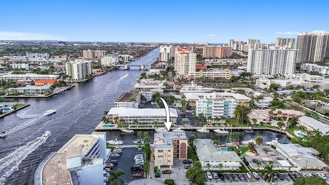 birds eye view of property featuring a water view