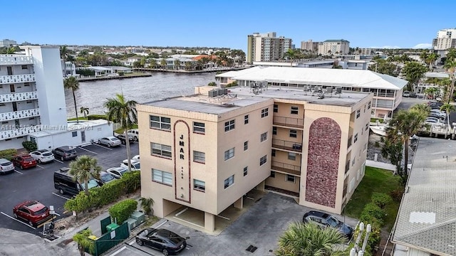 birds eye view of property with a water view