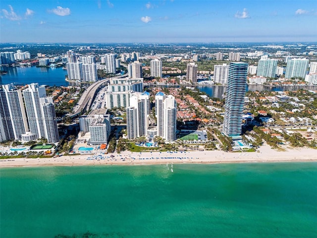 drone / aerial view with a view of the beach and a water view