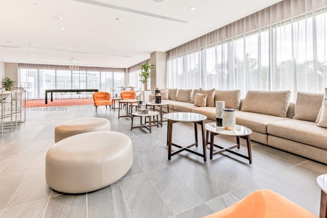 living room featuring light tile floors