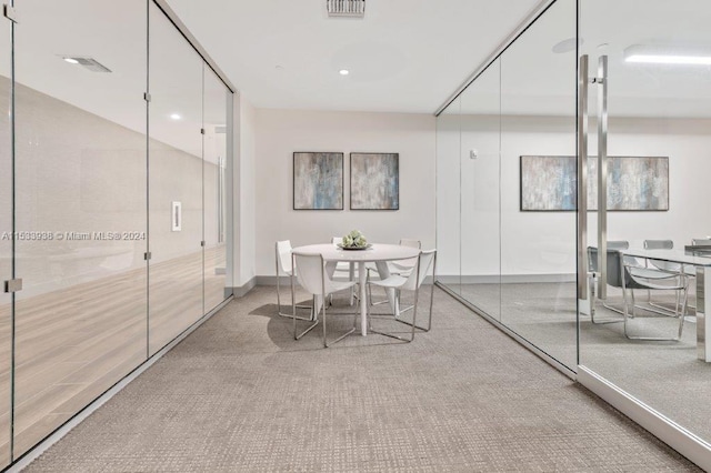 view of carpeted dining area