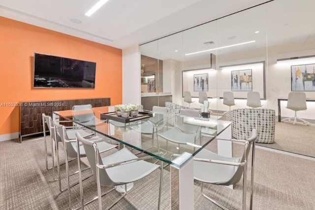 view of carpeted dining area