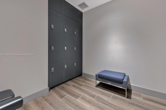 sitting room with light hardwood / wood-style flooring