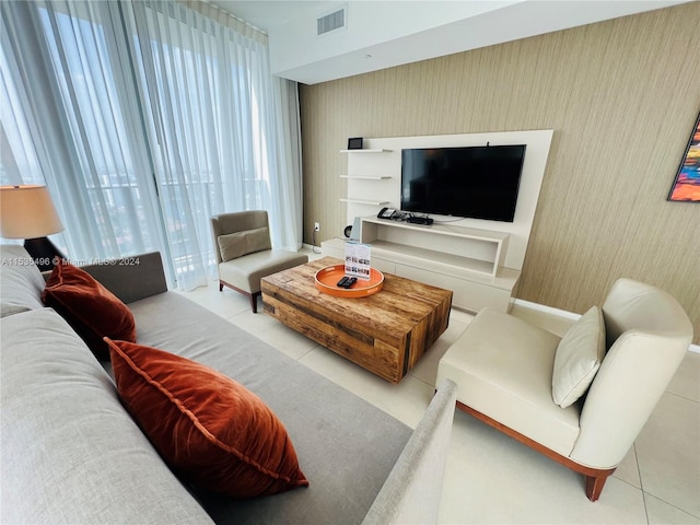 tiled living room featuring plenty of natural light