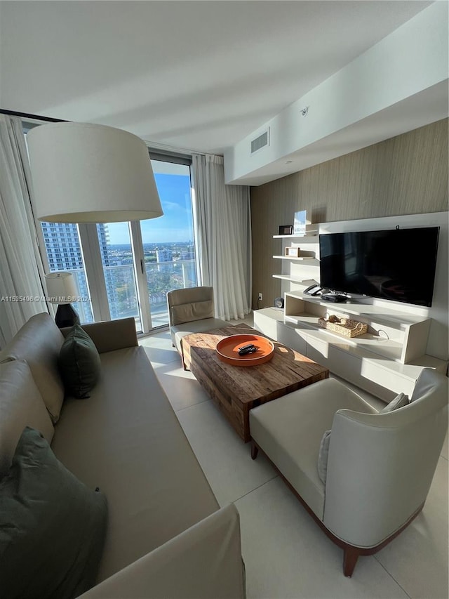 living room with floor to ceiling windows