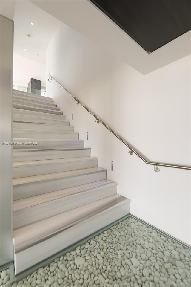 stairway with carpet floors