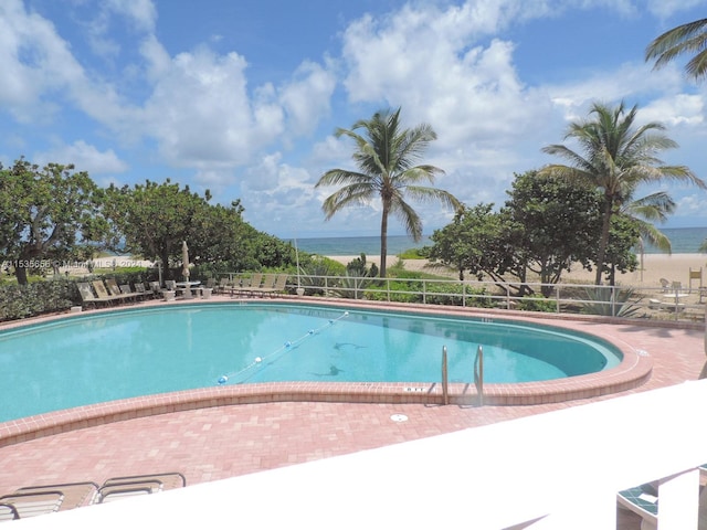 view of swimming pool with a patio area